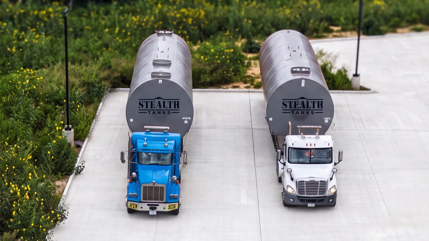 Two Stealth Tanks double-wall USTs delivered on flatbed trucks