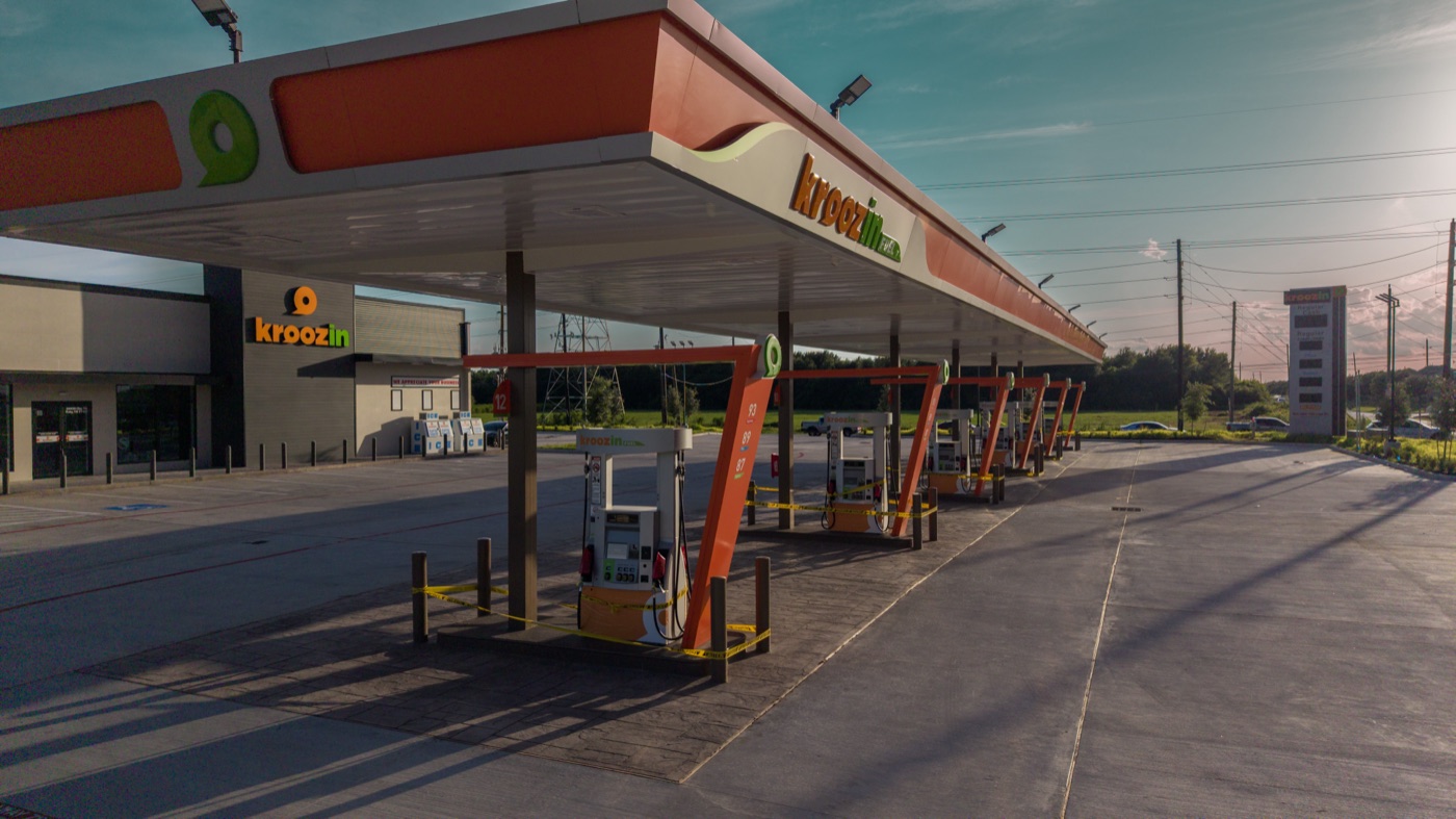 Completed fuel station forecourt with canopy and dispensers